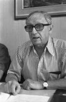 Yosef Tamir of the Liberal party holding a press conference.