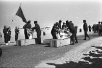 The Israeli soldiers covering with national flag the coffins of the bodies of Israeli soldiers who were missed since the Yom Kippur War which were returned by the Egyptians.
