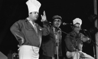 The famous entertainment group Hagashashim, performing their famous humoristic pieces before thousands of soldiers who participated in the War of Shlom Hagalil.