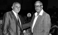 Owner of Yediot Achronot Noah Moses (L) speaking with the Editor of Hatzofe Alter Welner.
