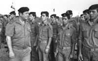 IDF holding an end of Tank commanders course at hayarkon Parke with the prsence of families and CO of the Armoured Corps.