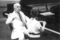 Enrique Barenboim giving piano lessons to young musicians at the Jerusalem Music Accademy.