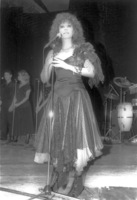 Yardena Arasi performing in a gathering party for wives of the Bezek Company workers.