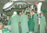 Health Minister Ehud Olmert visited Jerusalem's Sha'arei Zedek Hospital to see an open heart operation being performed on a six month-old baby.