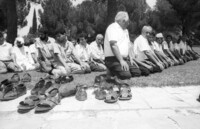 Moslems praying outside th3e Prime Ministers office in Jerusalem.