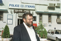 Beni Alon leaving the Police crime squad after being investigated for his illegal activities.