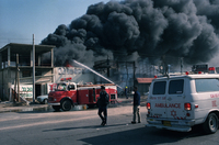 The fire brigade trying to chese the heavy fire ina factory on the Ayalon highway.
