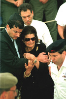 Lea Rabin and her son crying during the funeral ceremony.