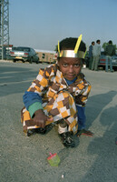 An Ethiopian boy who immigrated to Israel shortly ago playing at the immigration caravan suburb of Hulda.