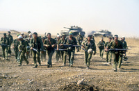 IDF soldiers with armour support acting on the Golan Hights with its new Israeli Merkava tanks.