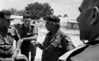 CO Southern Command Aluf Ariel Sharon visiting Israeli positions along the Suez Canal.