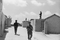 CO Southern Command Aluf Ariel Sharon visiting Israeli positions along the Suez Canal.