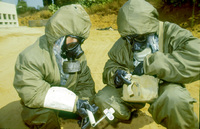 Girl soldiers teaching male soldiers the military warfare.