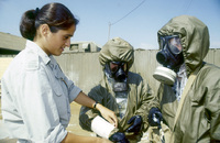 Girl soldiers teaching male soldiers the military warfare.