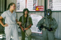Girl soldiers teaching male soldiers the military warfare.
