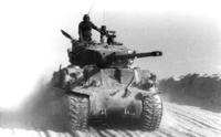 The Golani Corps performing manoeuvres with the old Sherman tanks.