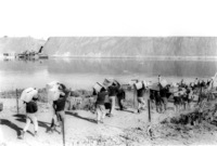 Egyptian soldiers from the surrounded Third Army, crossing the Suez Canal to receive food and drinking water.