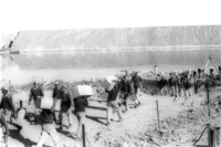 Egyptian soldiers from the surrounded Third Army, crossing the Suez Canal to receive food and drinking water.