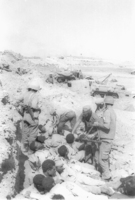 IDF Soldiers giving drinking water to the Egyptian POW's.