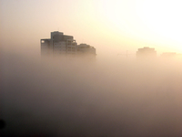 On an early morning a cloud lowered up to the groud covering the sight totaly for over an hour.