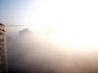 On an early morning a cloud lowered up to the groud covering the sight totaly for over an hour.