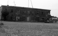 Photograph of: Jewish shops near the building of the city adinistration : City administration.