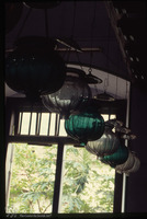 Photograph of: Hanging oil lamp, India.
