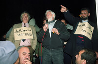 Arabs demonstrating calling to return the deportees from Lebanon.