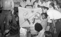 Hippies praying at the Western Wall on the 1900 anniversary of the destruction of the Jewish Temple by the Romans.