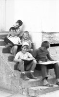 New immigrants participating on a free day leaarning the Hebrew songs.