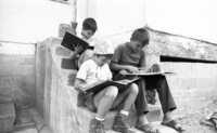 New immigrants participating on a free day leaarning the Hebrew songs.