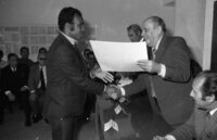 Histadrut giving certificates to students who finnished a surveyors Course.