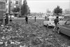 Angry flower-growers tossed bunches of wilting flowers from the roofs of buses and trucks in the centre of Tel Aviv.