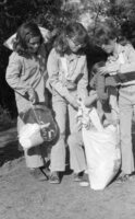Children collecting dresses to distribute to poor families.