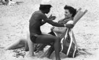 In spite of the sign saying that it danger and no bathing at the spot, dozens are using the dangerous seashore.