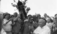 Druze farmers fumigating the olive trees at Tabcha.