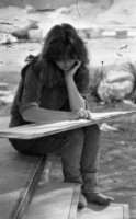 Pupils at a Givatayim high school take advantage of this week's pleasant weather to move a painting class outdoors.