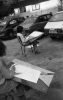 Pupils at a Givatayim high school take advantage of this week's pleasant weather to move a painting class outdoors.
