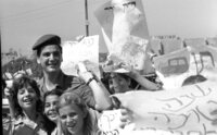 The Scouts movement sent their members to hand out to soldiers, apples and honey for Rosh Hashanah evening at intersections where soldiers are waiting for rides.