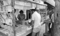 A stand selling New Year blessing cards.