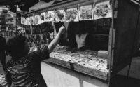 A stand selling New Year blessing cards.