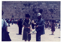 Dr. Mikhail & Mrs. Khanin with daughter at the Western Wall, Jerusalem, Israel.
