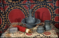 Photograph of: Torah Ark curtain, Mikveh vessel, Box, Ethrog container, Laver and basin, Esther scroll case.