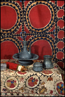 Photograph of: Torah Ark curtain, Mikveh vessel, Box, Ethrog container, Laver and basin, Esther scroll case.